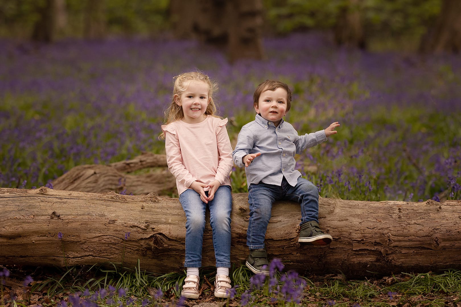 brother and sister sat in the bluebell woods, family photographer Sutton Coldfield birmingham