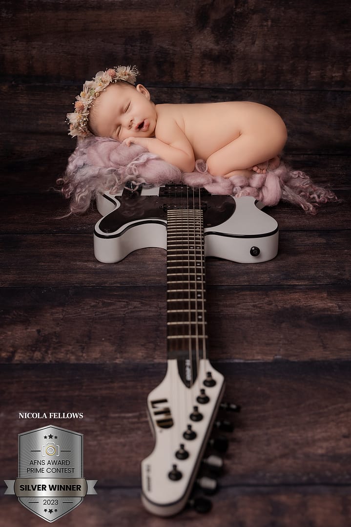 baby on a guitar newborn photographer sutton coldfield newborn photographer birmingham